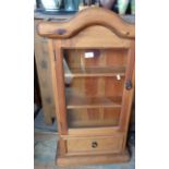 Pine wall cabinet with glazed door and single drawer