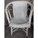 Painted wicker armchair