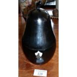 Ebonised wood pear-shaped tea caddy with key, lined, 7" high