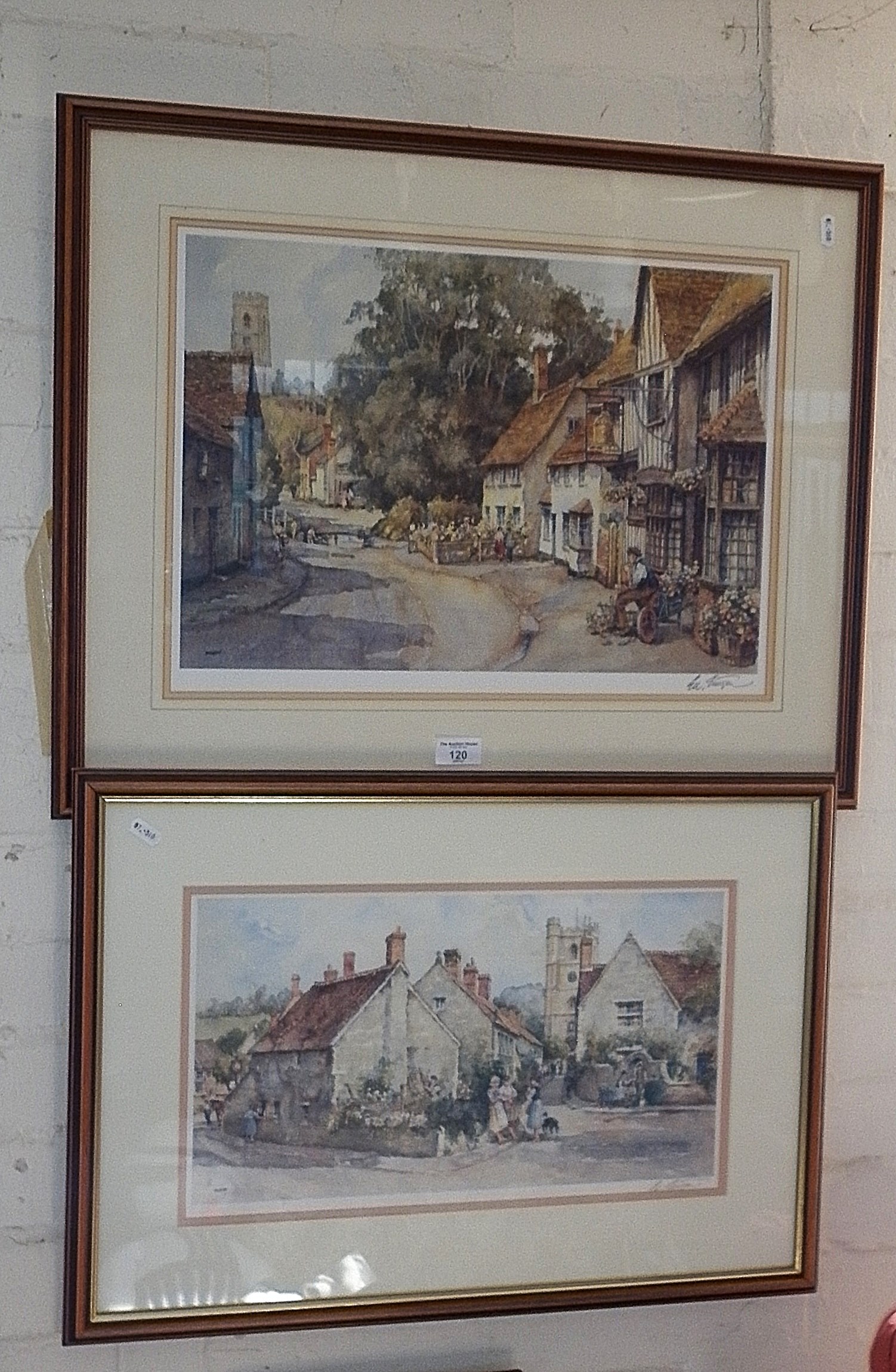 Two large Sturgeon colour prints of village scenes, signed in pencil