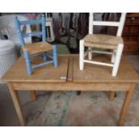 Two seater child's school desk, and two rush seat child's chairs