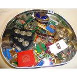 Tin containing badges, buttons etc, some enamel