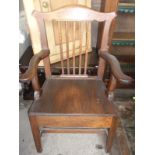 19th c. Trafalgar back elbow chair with solid seat