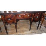 William IV cross banded mahogany sideboard having three drawers on turned legs