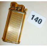 Gold plated Dunhill lighter marked under as UNIQUE DUNHILL 50640