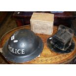 WW2 Civil Defence police steel helmet, a WW2 black-out headlight cover and an ARP gas mask