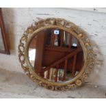 Circular gilt framed wall mirror