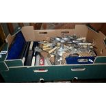 Collection of assorted cutlery in one box