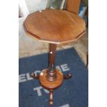 19th c. mahogany occasional table on carved central column above tripod platform base