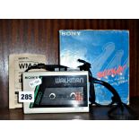 Vintage Sony Walkman WM-22 with original packaging and instruction booklet