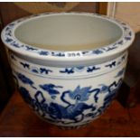 Chinese blue and white jardiniere or fish bowl with foo dog decoration, approx. 31cm diameter