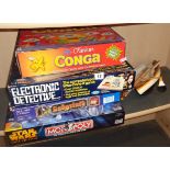 Four vintage board games including 1970s Electronic Detective by Ideal Toys and a model rowing boat