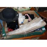 Two boxes of lacework, fabrics, dolls clothes, gloves and a Christys of London bowler hat