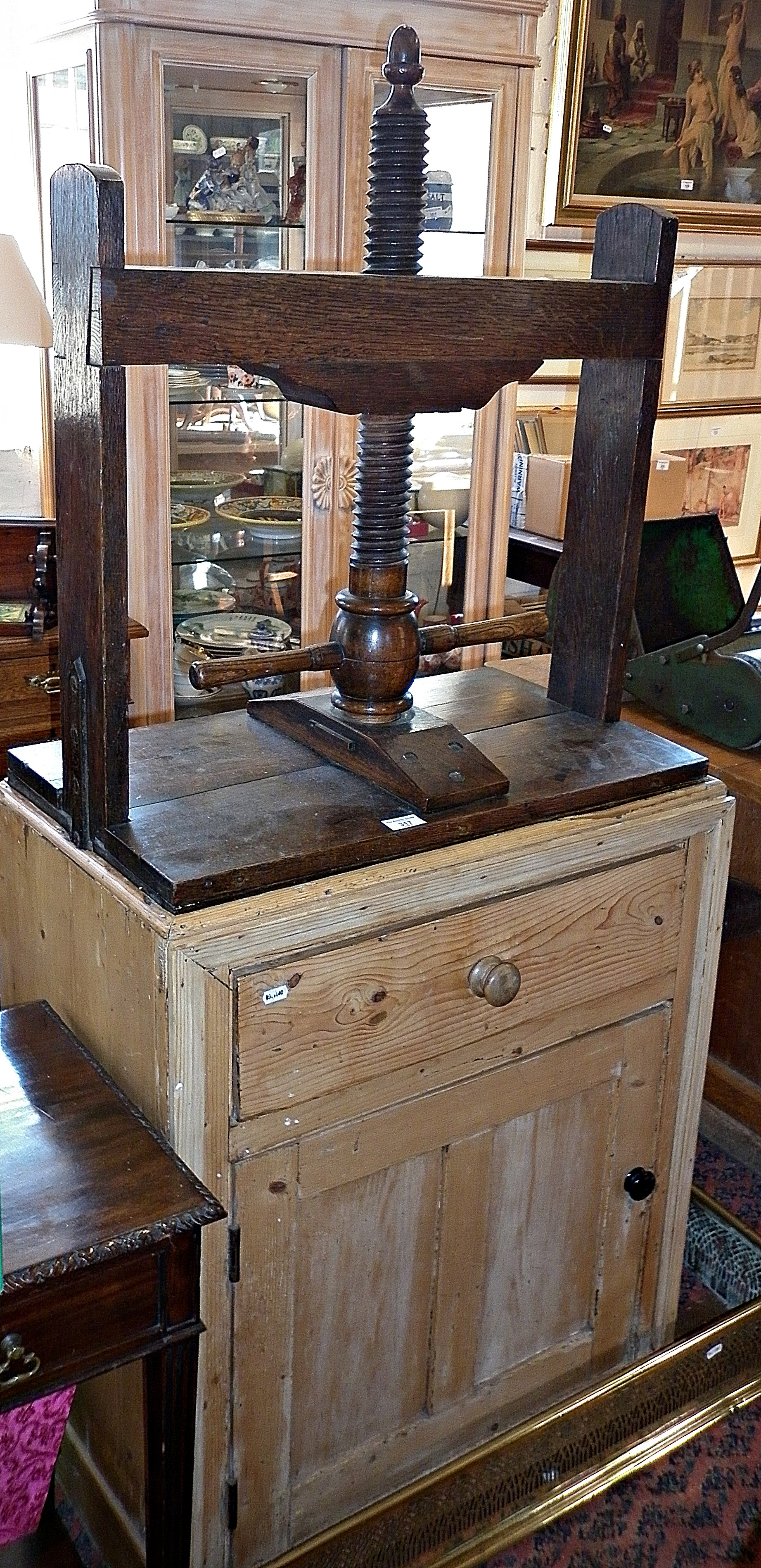 19th c. oak book press on pine base with cupboard and drawer