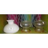 Three glass lamp shades