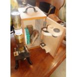 A Schutz Ruf & Co., Kassel student's compound microscope with fitted box, slides and accessories