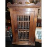 Old wooden egg storage cupboard with single door