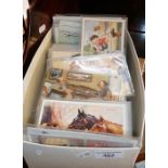 Shoebox containing humorous and other postcards, some antique