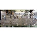 Collection of cut glass scent bottles, inc. four pairs and one silver topped example (11)