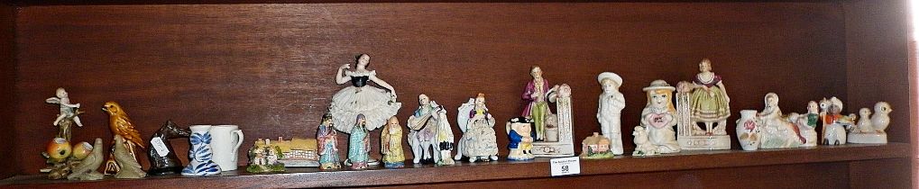 Shelf of assorted china ornaments inc. Victorian and Edwardian Staffordshire figurines