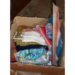 Box of assorted vintage fabrics and materials
