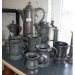 Collection of 19th c. pewterware, inc. flagons, tankards and measures