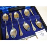 Set of six silver coffee or small teaspoons in case, with shell finials. Fully hallmarked -