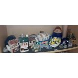 Shelf of assorted china and pottery and several ceramic models of butcher's shops