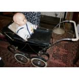 Triang coach built doll's pram with hood and cover, c. 1950's and an "OK" Kader plastic baby doll