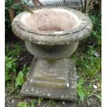 Stonework garden urn