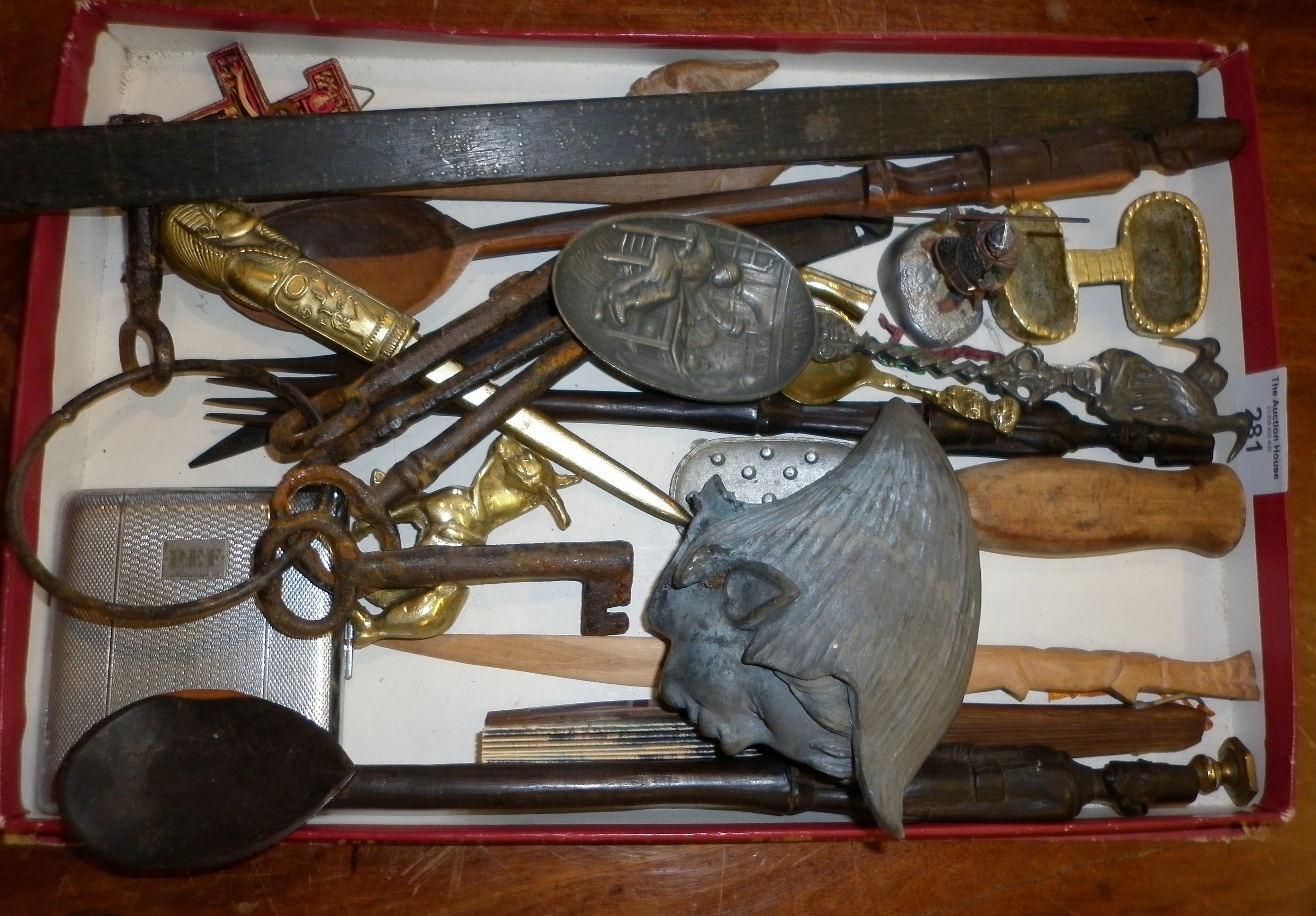 Miscellaneous items inc. bunch of old keys, spelter head of a pixie, carved wood African salad