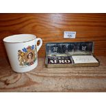 1953 Queen Elizabeth II Coronation souvenir tin with all original chocolate contents, together with