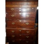 Georgian mahogany chest on chest with brushing slide and brass swan neck handles on bracket feet,