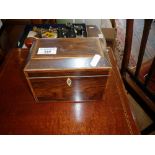 Victorian rosewood and inlaid tea caddy of two sections and having ring handles