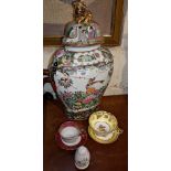 Chinese porcelain vase with cover, teacups and saucers