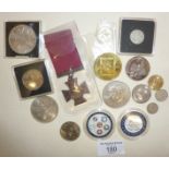 Assorted coins and a replica medal
