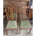 Set of four Edwardian inlaid oak dining chairs with drop-in seats