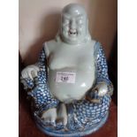 Chinese smiling buddha figure impressed marks to base, 22cm