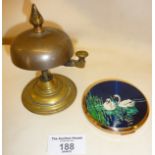 Antique brass footed shop counter bell, with a vintage Stratton powder compact