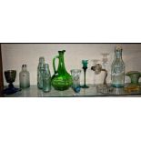 Shelf of retro glassware, candle holders, etc.