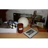 Assorted items inc. decorative balls, an etching by Gertrude Hodges, etc.