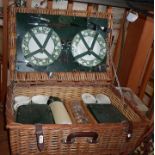 An Optima wickerwork picnic hamper fully fitted