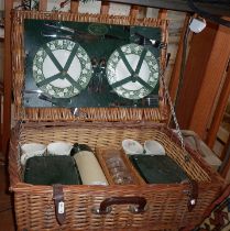 An Optima wickerwork picnic hamper fully fitted
