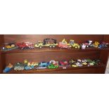 Joal diecast JCB digger, similar timber lorry with grab, and two shelves of assorted diecast