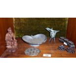 Chinese carved hardwood figure, pewter lotus leaf dish, a bronze libation cup, etc.
