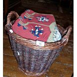 Wicker work waste paper basket and a Kelim rug