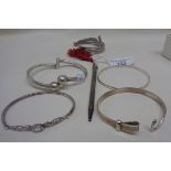 Sterling silver propelling pencil, four silver bangles and two others, silver weight 75g