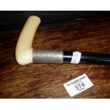 Silver banded walking cane with bone handle