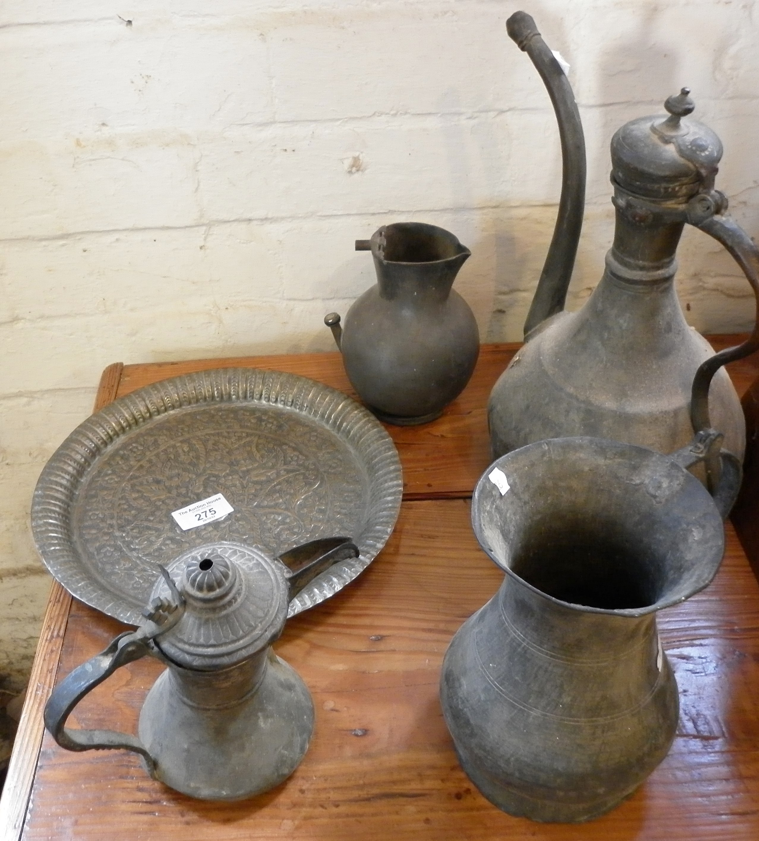 Persian embossed copper plate and two Turkish coffee pots