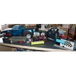 Radio controlled four-wheel drive truck and a Scalextric racing car and accessories